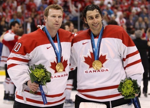 Jonathan Hayward/The Canadian Press Team Canada goaltenders Roberto Luongo, right, and Martin Brodeur show off their gold medals after Luongo backstopped Canada to a 3-2 overtime win against the United States in the championship game of the 2010 Olympics in Vancouver. Luongo supplanted Brodeur as the starter in that tournament and is returning for the 2014 Olympics in Sochi, Russia, while Brodeur was left off this year's roster in favour of Carey Price and Mike Smith.