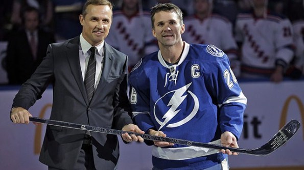 Chris O'Meara/Associated Press Tampa Bay Lightning captain Martin St. Louis and his boss, general manager Steve Yzerman, were all smiles during this pre-game ceremony. However, reports indicate their relationship soured when St. Louis was initially left off Team Canada's roster for the Sochi Olympics, for which Yzerman was also the architect. When Tampa teammate Steven Stamkos was ruled out (broken leg), St. Louis was tabbed to take his place and Canada went on to win gold, but reports persist that St. Louis wants to be traded — preferably to the New York Rangers — and he hasn't exactly denied those claims in declining to elaborate on his conversations with Yzerman regarding his future.