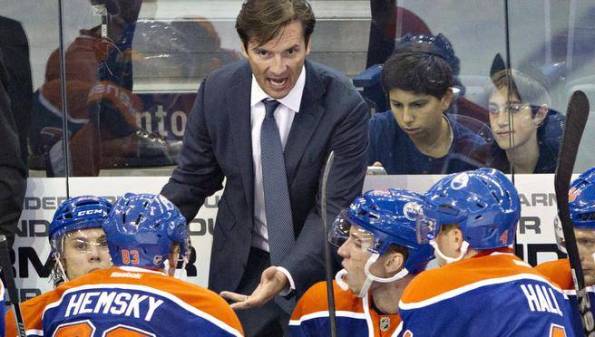 JASON FRANSON/The Canadian Press Edmonton Oilers head coach Dallas Eakins delivers his message to players during a pre-season game against the New York Rangers in Edmonton back on Sept. 24, 2013. It hasn't come easy for Eakins in his first season behind Edmonton's bench, but his message appears to be finally getting through, with the Oilers having won five of their past six games.