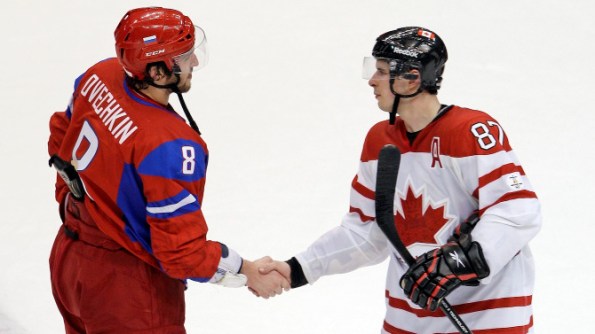 The Canadian Press Sidney Crosby of Team Canada, right, and Alex Ovechkin of Team Russia shake hands following a game at the 2010 Olympics in Vancouver. These two NHL superstars will captain their respective countries at the 2014 Olympics in Sochi, Russia, this month.