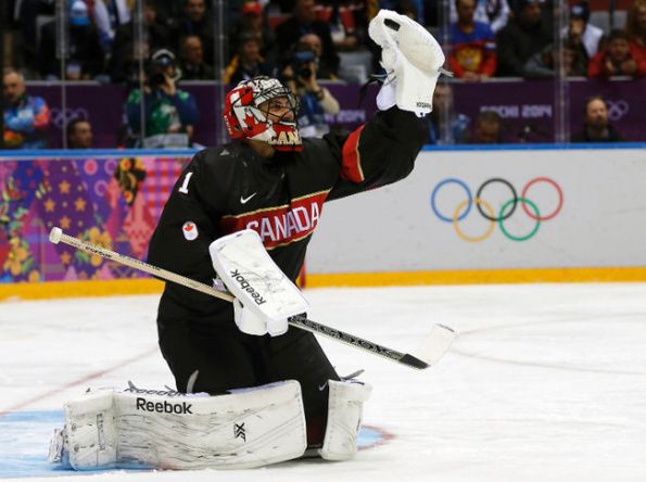 PHIL NOBLE/Reuters Team Canada goaltender Roberto Luongo gloves down a shot in making one of his 23 saves against Austria during Friday's 6-0 shutout win in preliminary-round action at the 2014 Olympics in Sochi, Russia. Luongo's flawless showing might have been enough to cement him as Canada's starter against Finland on Sunday.