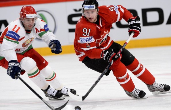 Jonathan Nackstrand/Getty Images Steven Stamkos, right, seen here representing Canada against Belarus in international competition, won't be making the trip to Sochi. The Tampa Bay Lightning sniper was not cleared by doctors as his attempted recovery from a broken leg fell just short and his spot on Canada's roster was awarded to Tampa Bay teammates Martin St. Louis. Stamkos will certainly be missed as he was expected to complement Sidney Crosby on the team's top scoring line.