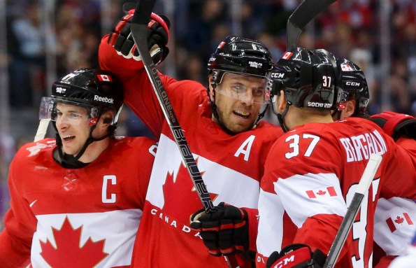 Julio Cortez/The Associated Press Team Canada defenceman Shea Weber, centre, celebrates with forwards Sidney Crosby, left, and Patrice Bergeron after scoring a goal against Norway during their round-robin game at the 2014 Olympics in Sochi, Russia, on Thursday. Weber opened the scoring in the second period and Canada went on to win 3-1.
